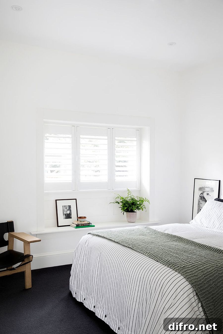 Light-filled white bedroom in the revamped home