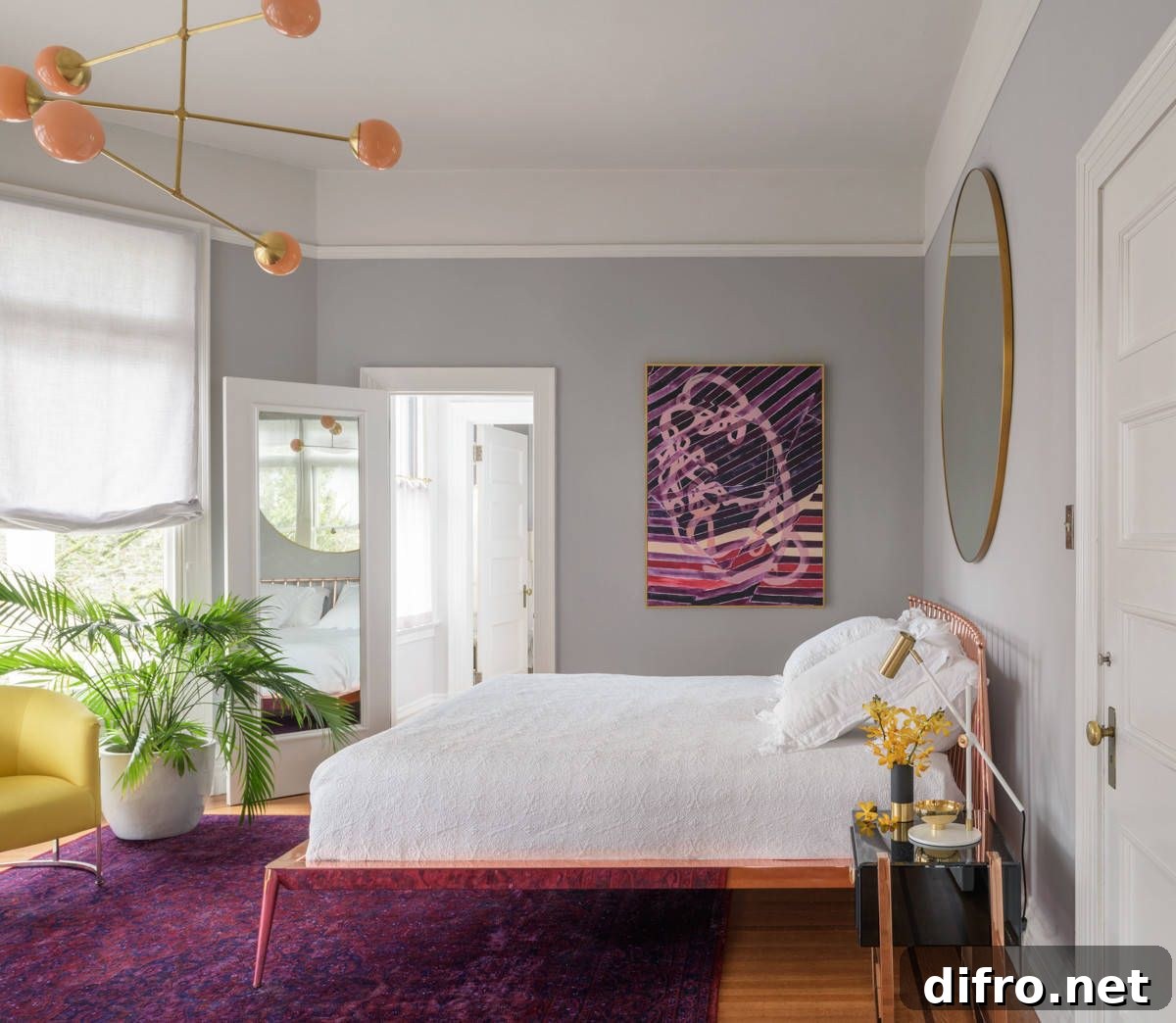 Modern Victorian bedroom in white and gray with a mirrored door