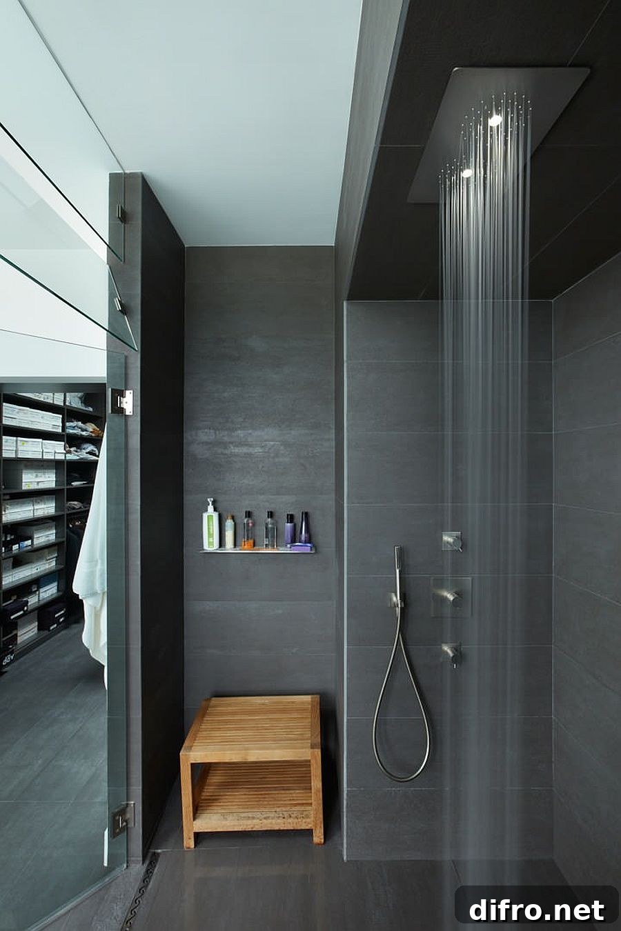 Polished charcoal gray bathroom with rainfall shower