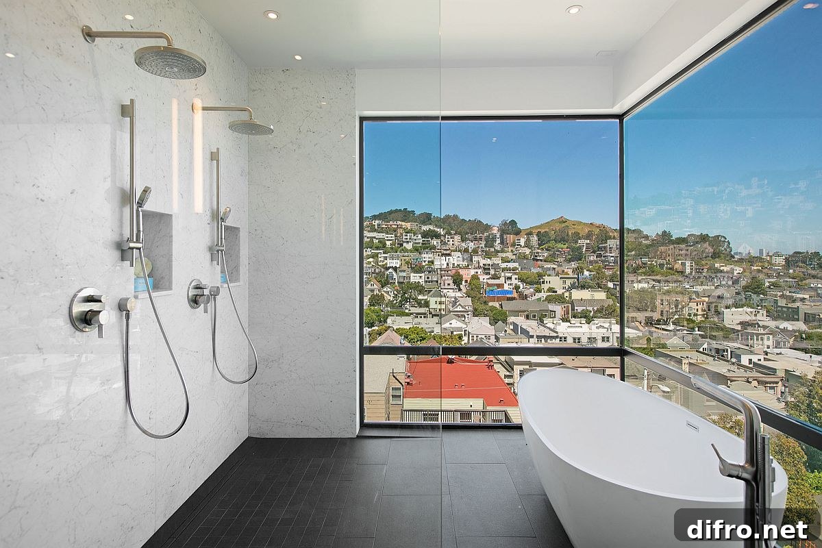 Trendy bathroom with twin rainfall showerheads and freestanding bathtub