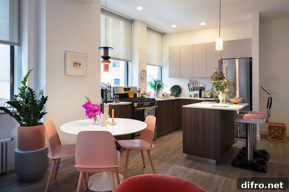 Light pastel pink chairs for the small dining area in the NYC apartment