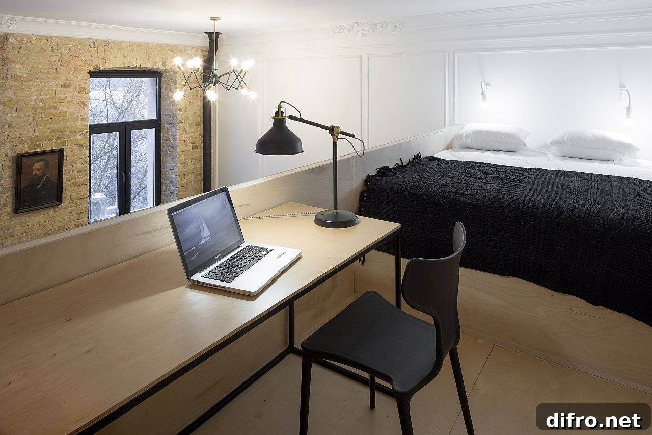 Loft level bedroom and work area