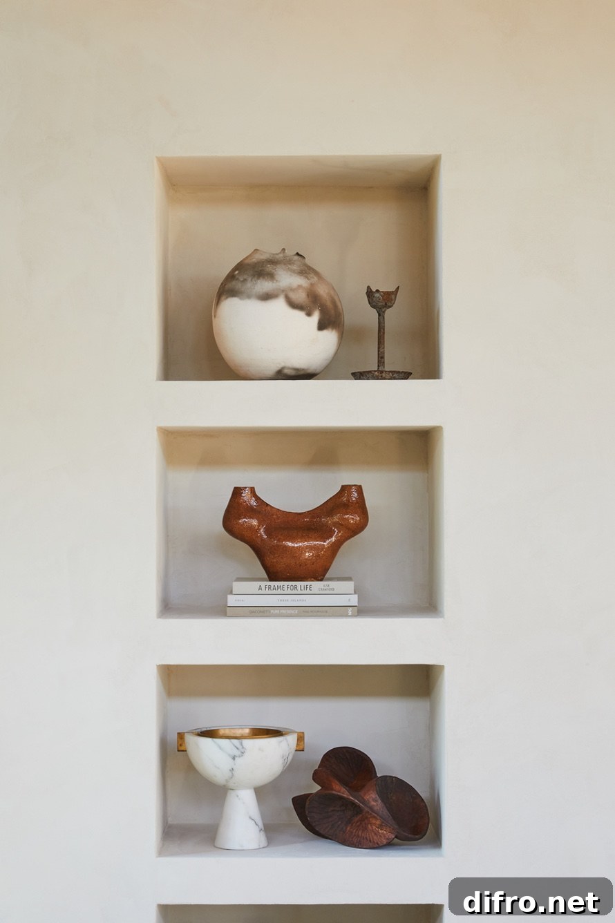 Wall niche with compartments displaying curated objects