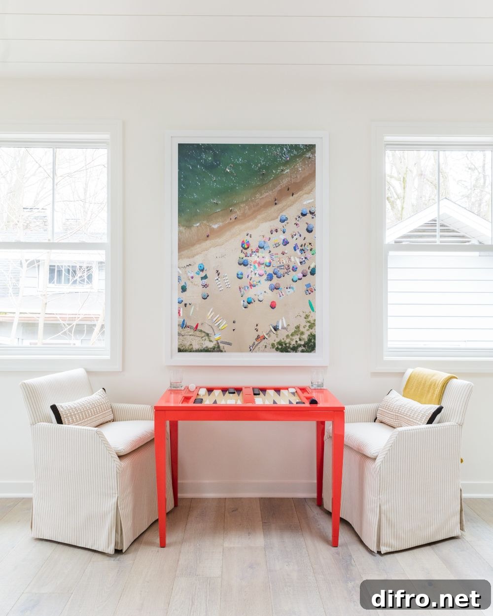 Bright red backgammon table with photography above