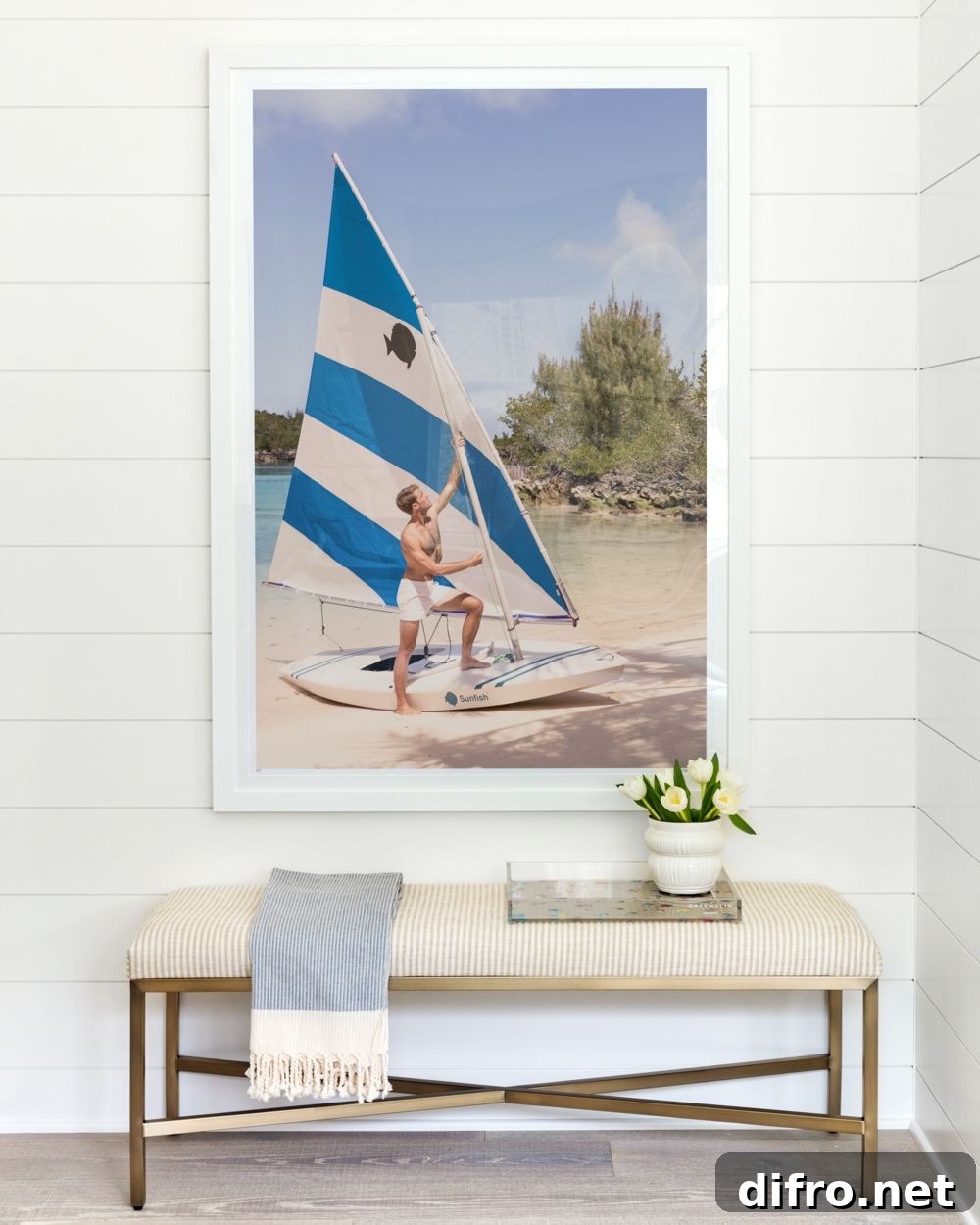 Photograph of a sailor above bedroom bench