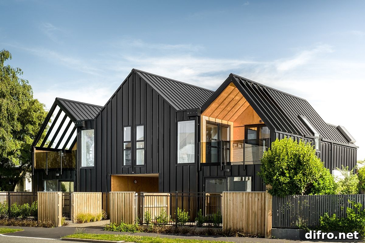 Wood and steel building in New Zealand holds four space-savvy apartment units