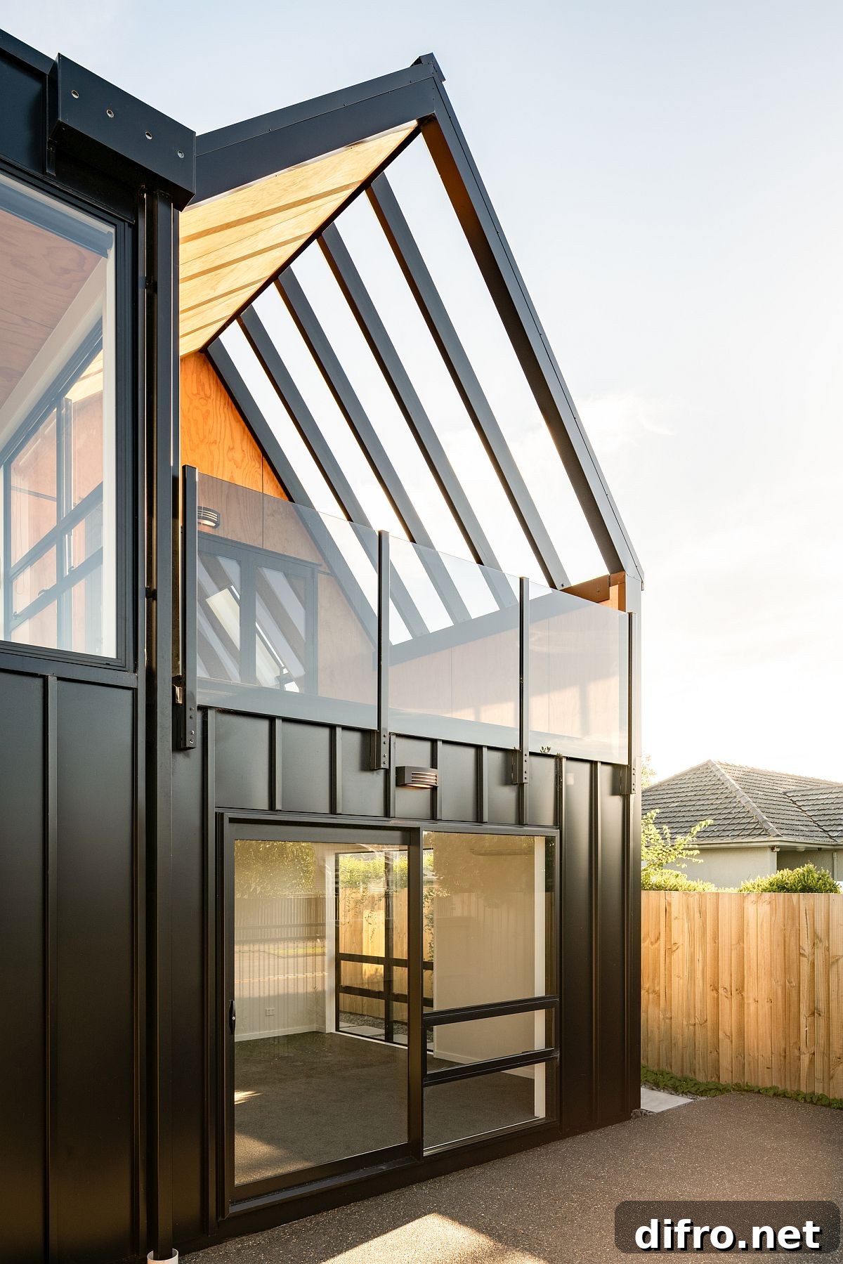Modern building in New Zealand with four small single-bedroom apartments