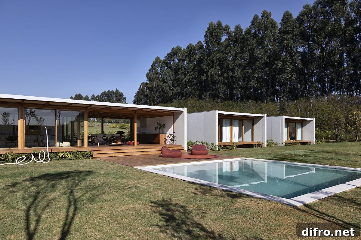 Wooden deck and pool extending living area outside