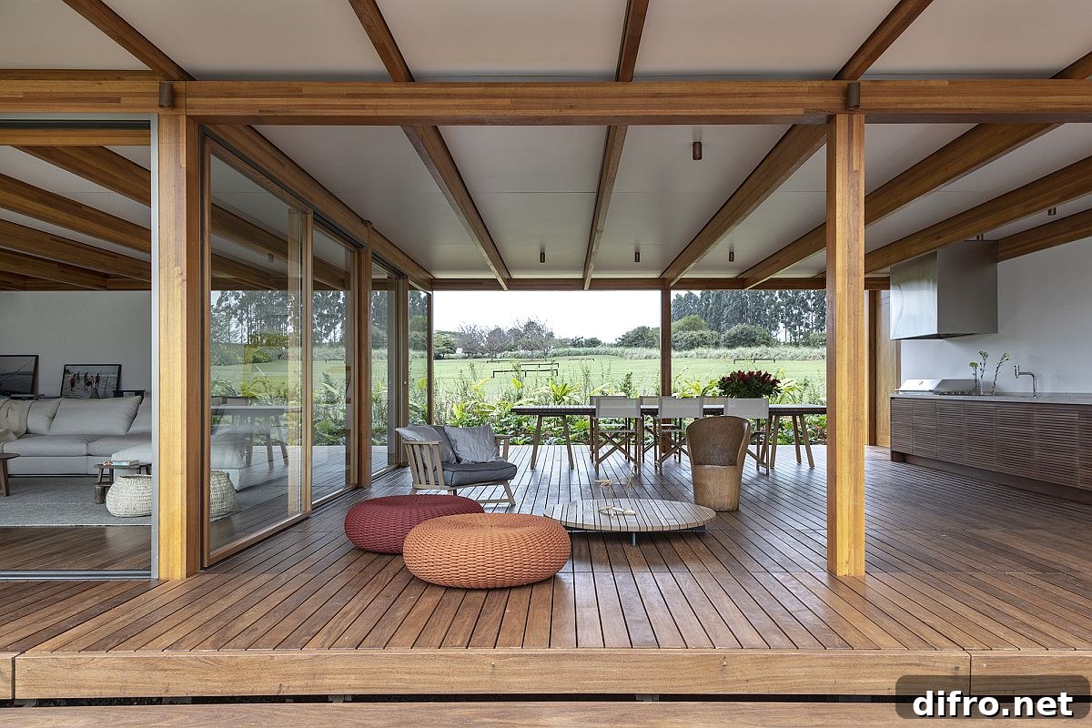 Open kitchen and dining area connected to landscape