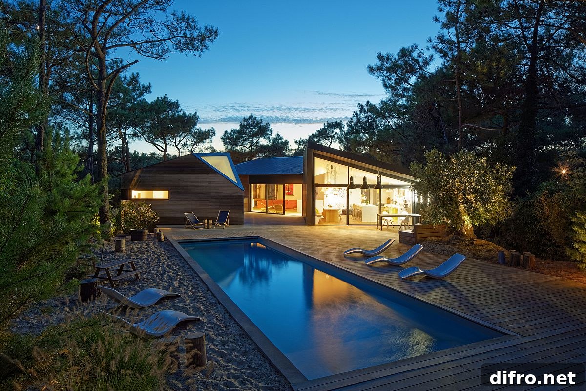 Small forest of strawberry tree, yucca, and pines surrounds the lovely vacation home