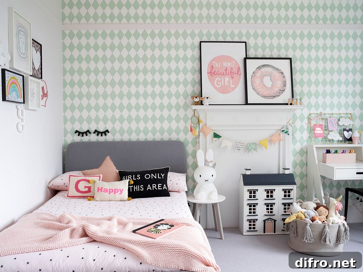Accent wallpaper in Scandinavian-inspired girls' bedroom