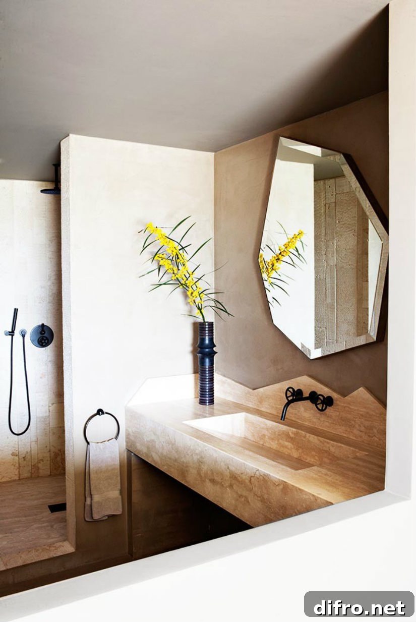 Geo mirror in luxury marble bathroom