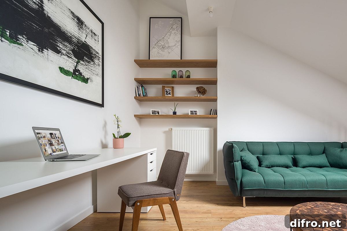 Home workspace and living area are rolled into one on the upper level of the small apartment
