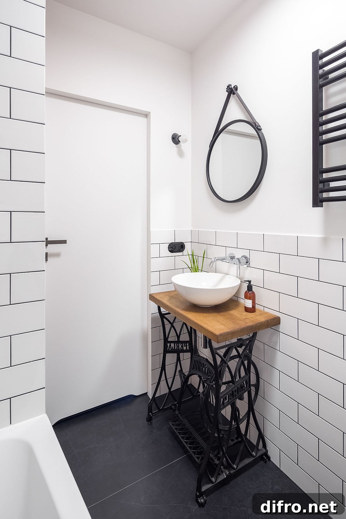 Old sewing machine turned into a lovely sink in the vintage bathroom