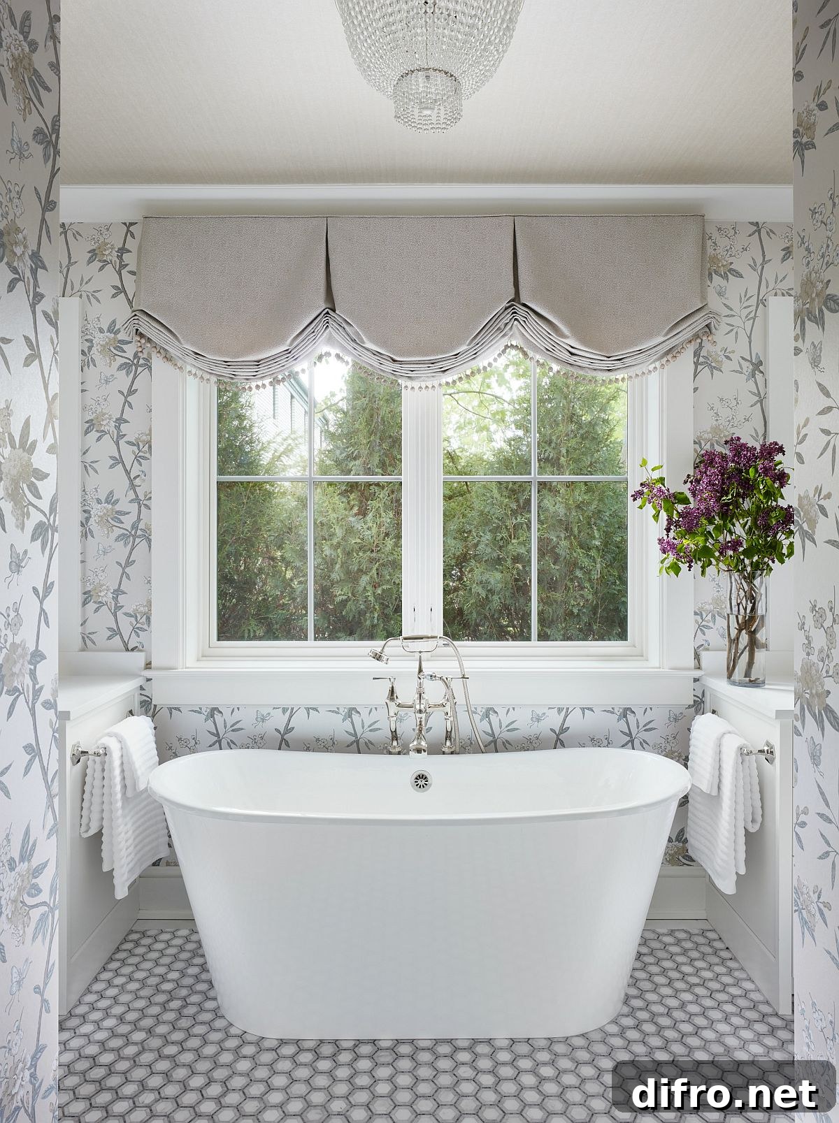 Captivating spa-styled bathroom in white and gray with walls draped in flowery pattern