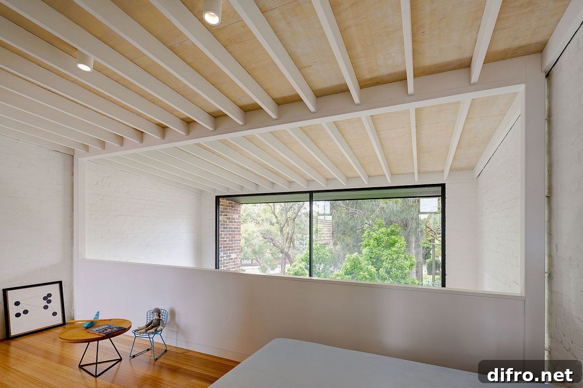 Ensuite on the top level with a view of the dining area below and the rear garden