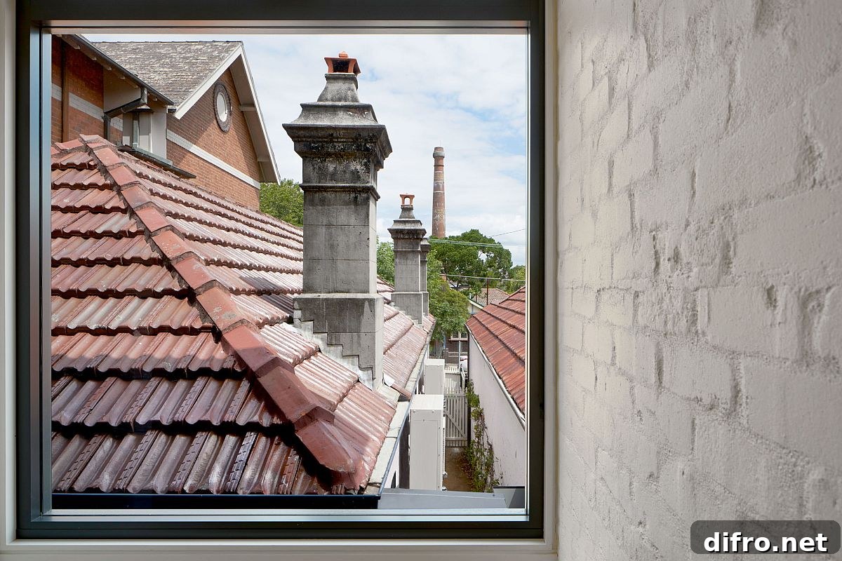 Large glass window on the upper level offers lovely views of the suburban neighborhood