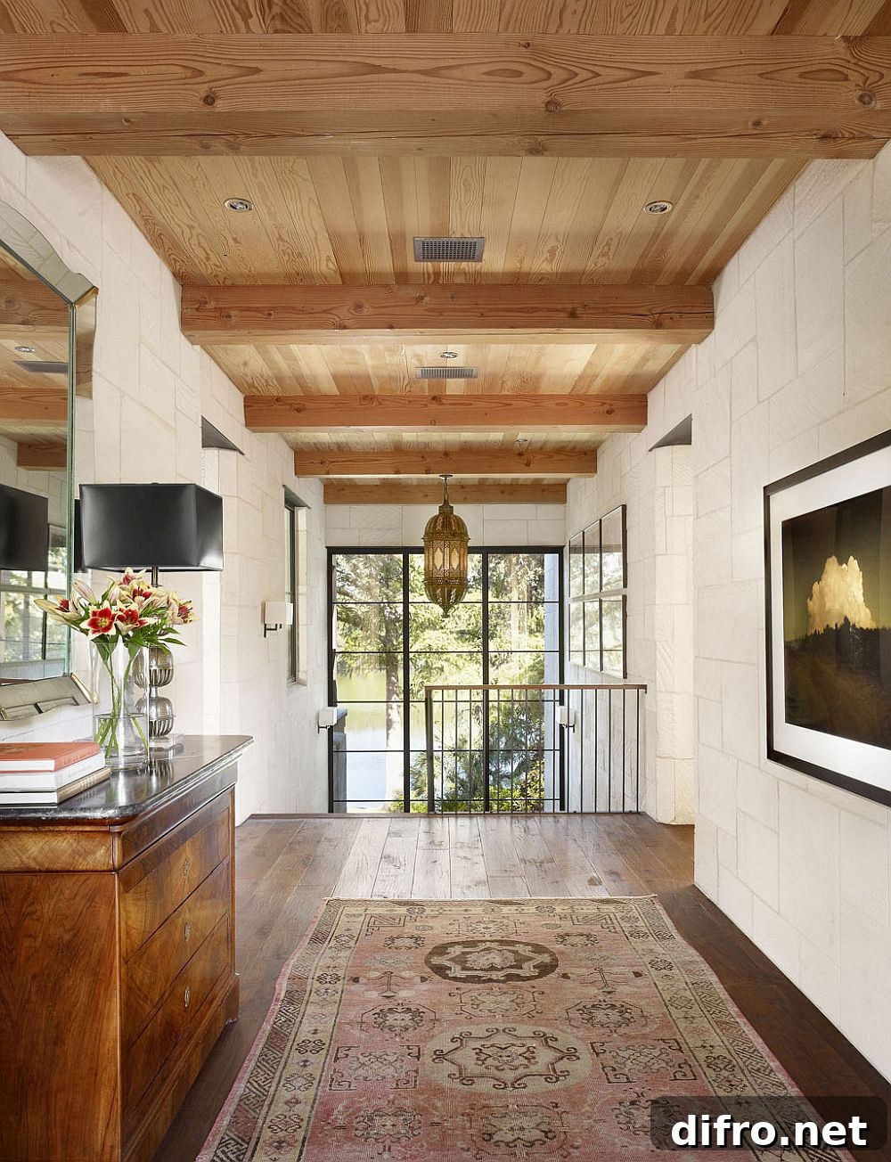 Staircase landing decorated with artwork and a standout carpet