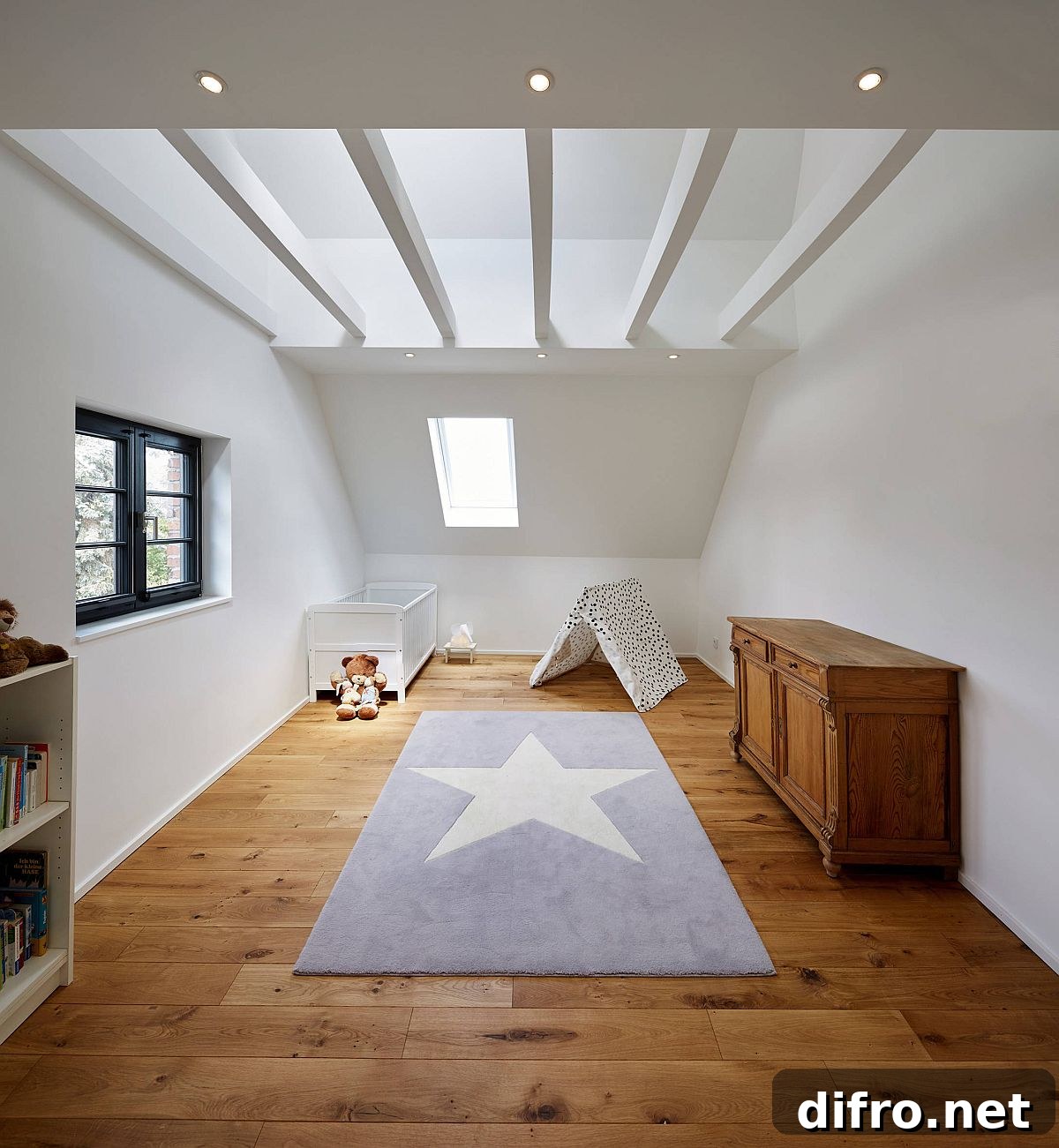 Balanced modern and farmhouse nursery in white and wood