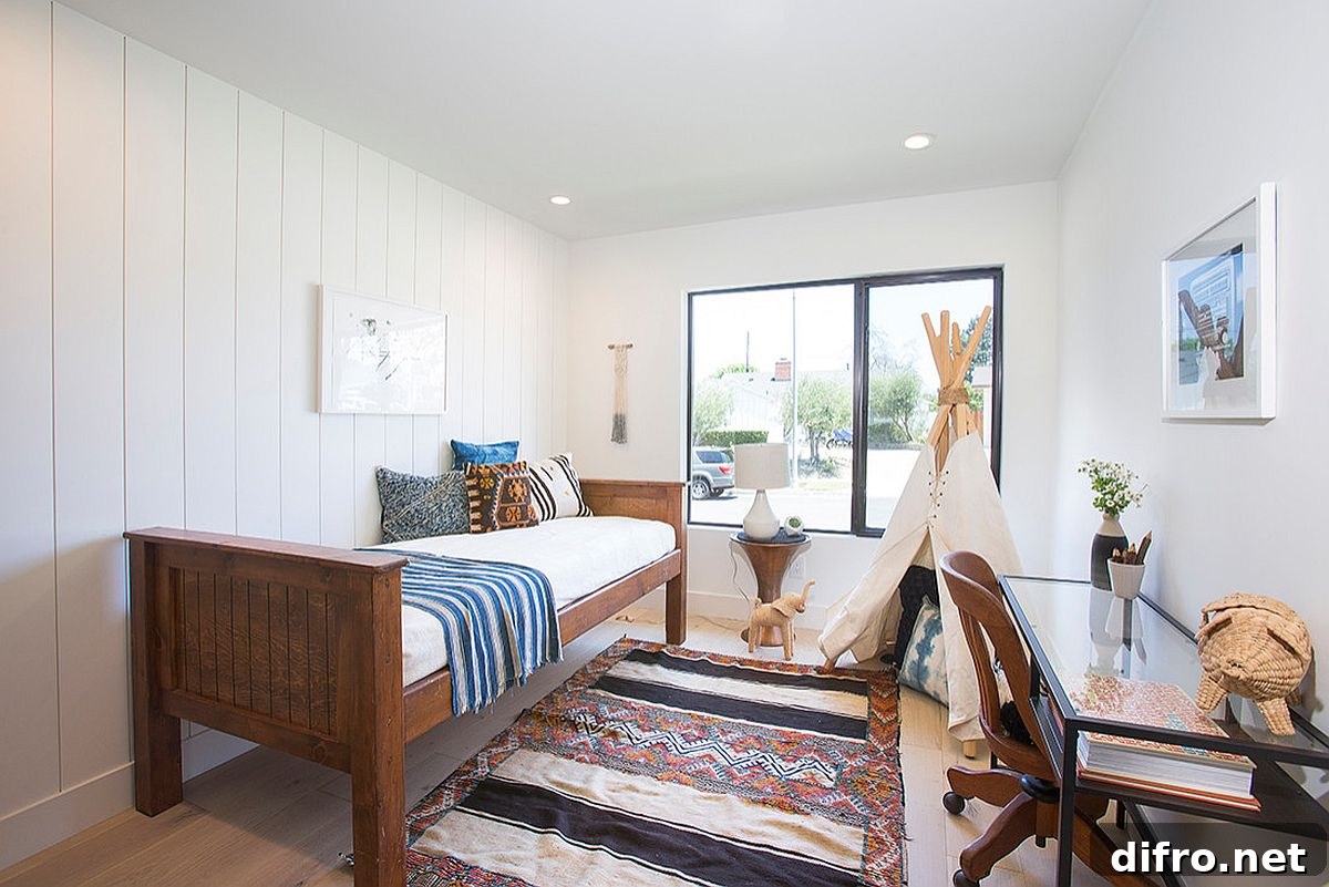 Nursery with textured walls and wood accents