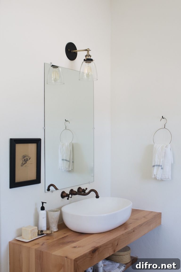Bathroom with dark and light details
