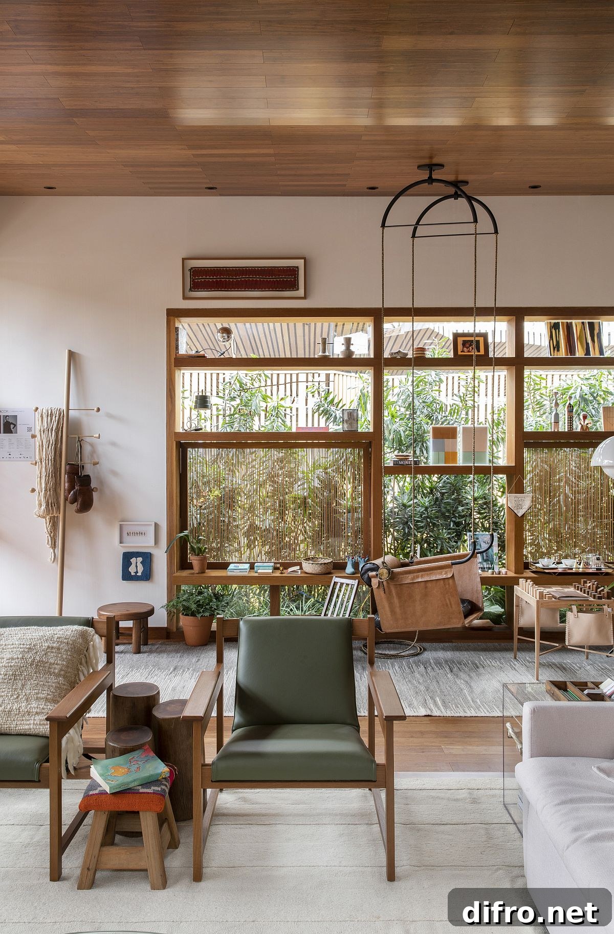 Fabulous hanging chair offers another sitting space inside this family room