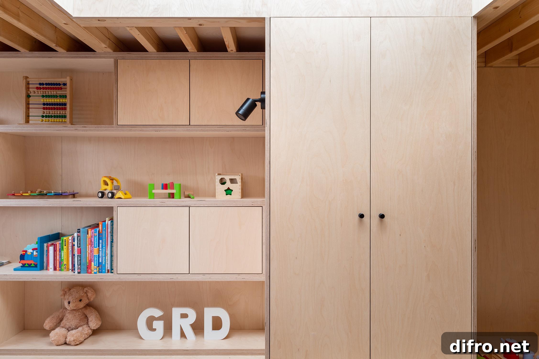 Plywood walls, cabinets and shelving create cohesive interiors