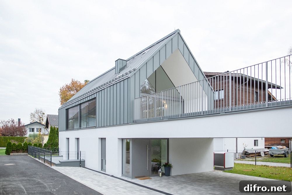 Shared garage and garden area separating the houses