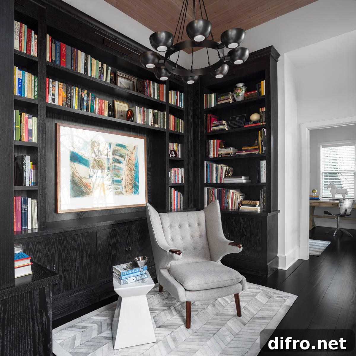 Living room with prominent black accents and black flooring