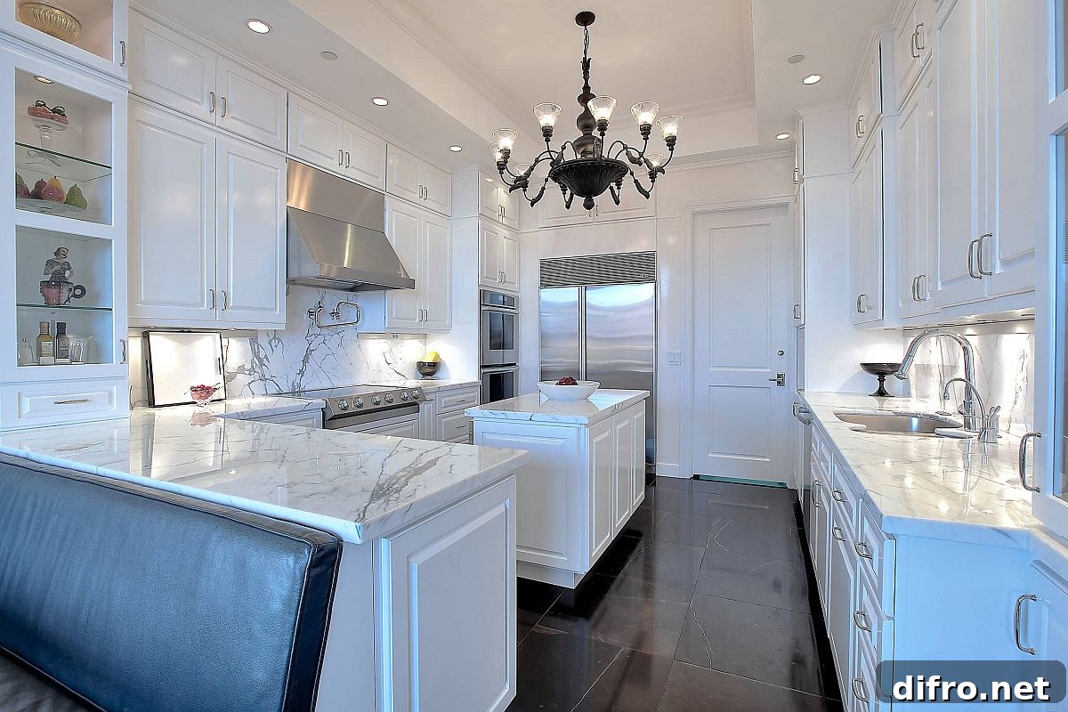 Modern transitional kitchen in white with glossy black floor and lighting