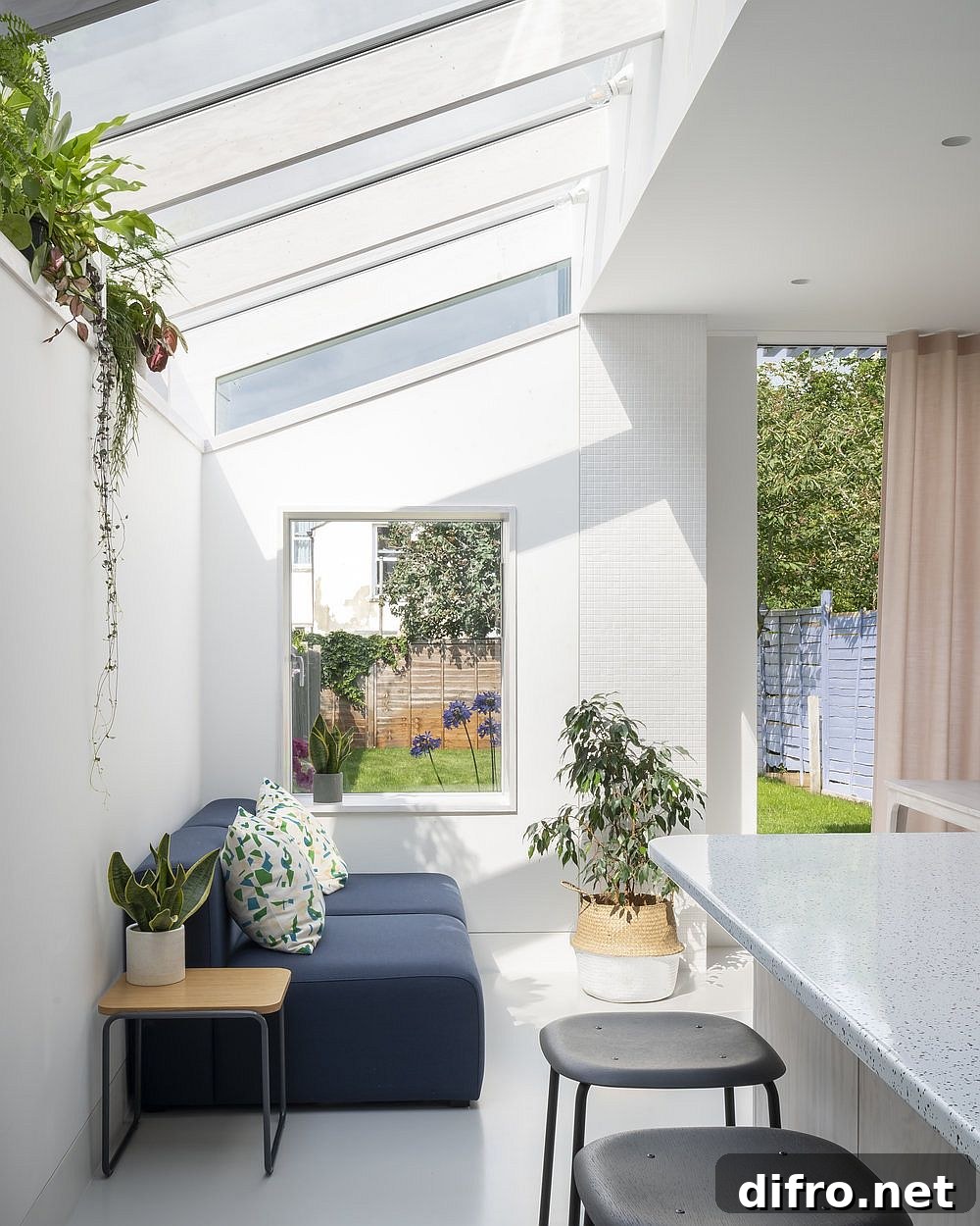 Large family space with kitchen and dining connects the old house with the garden