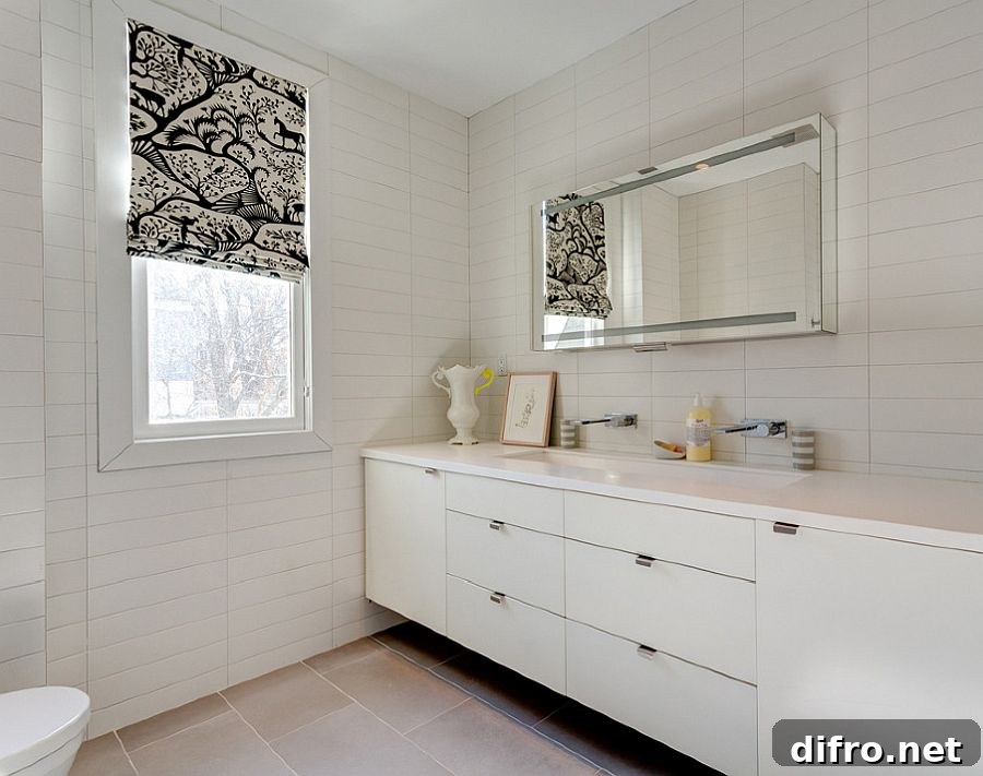 Contemporary white bathroom with black accent