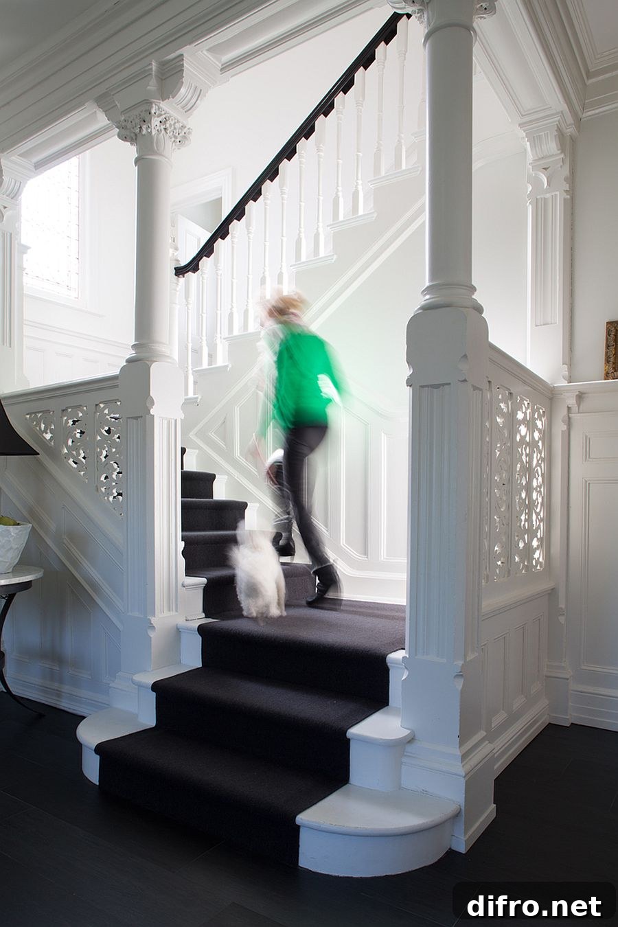 Traditional staircase inside a renovated home