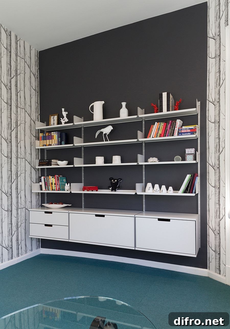 Gray accent wall with floating shelves in home office