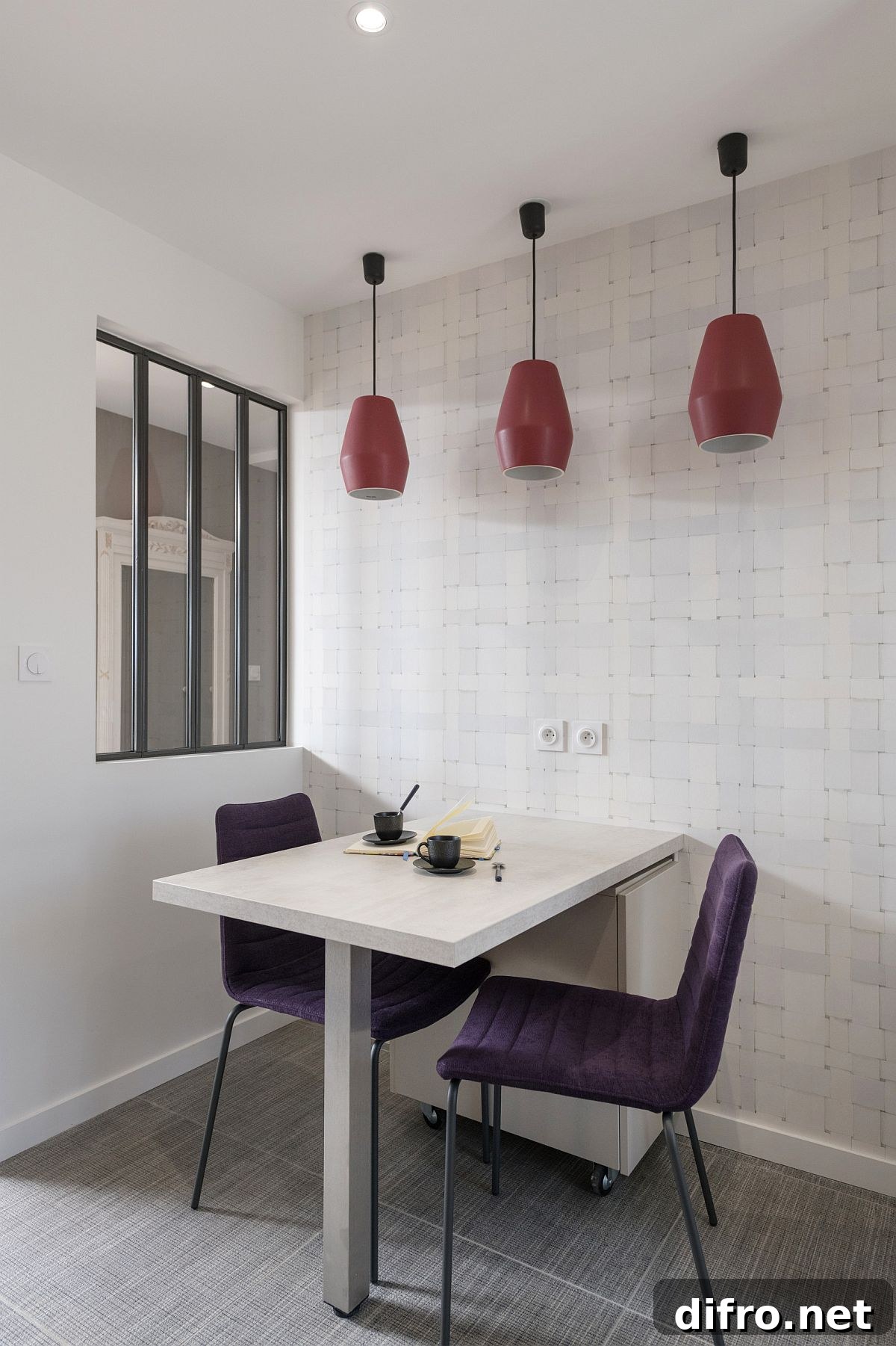 White minimal dining with red pendants