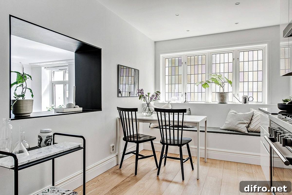 Banquette seating with black chairs