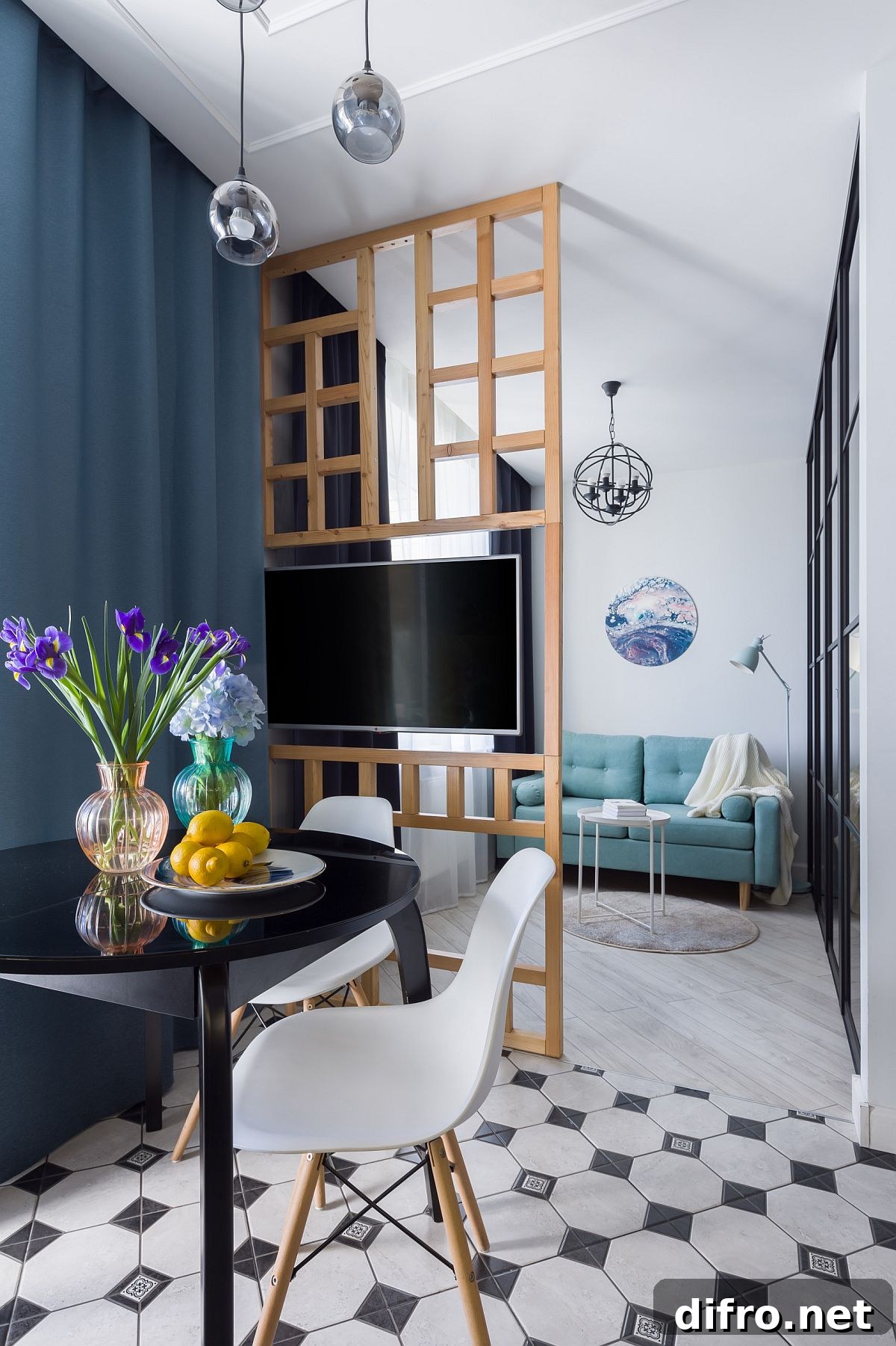 Tiny apartment dining with black table