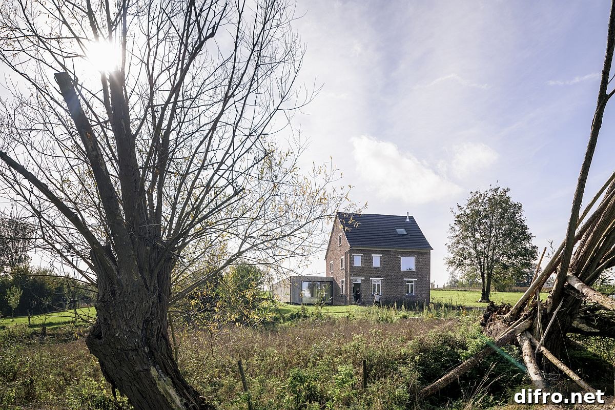 Beautiful little brick house among the fields along with a contemporary half-sunk extension