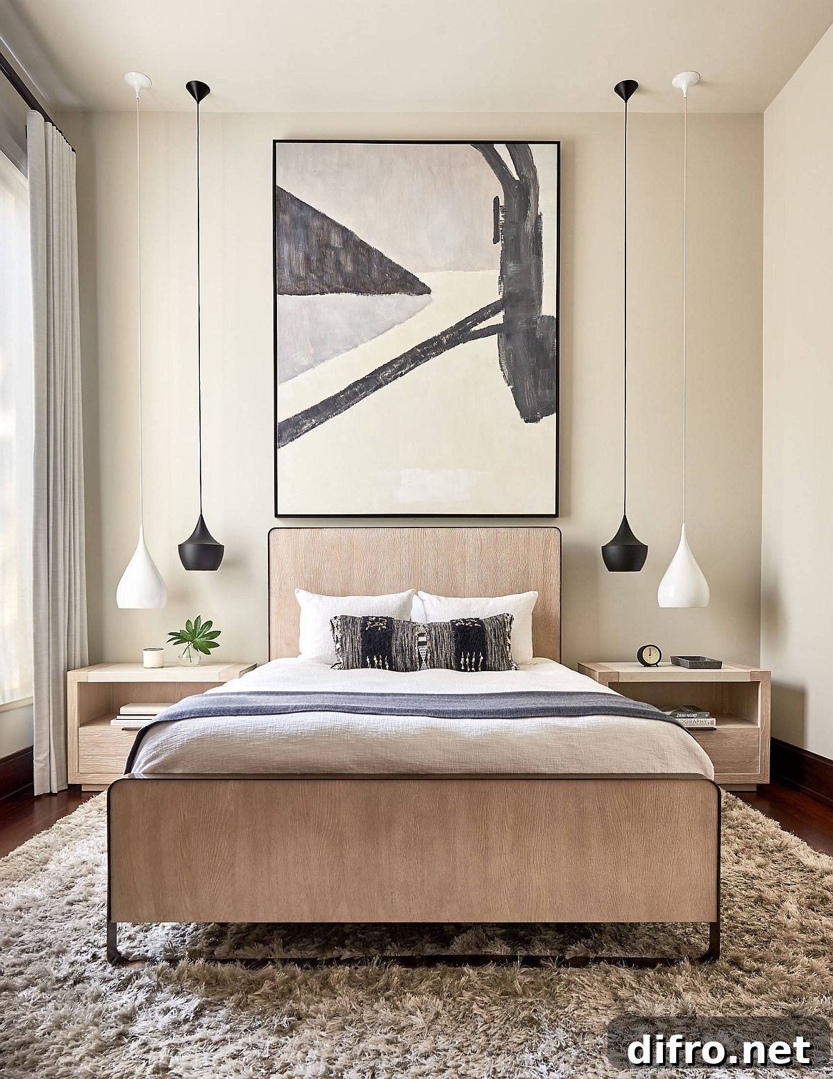 Black and white pendant lights in a contemporary bedroom