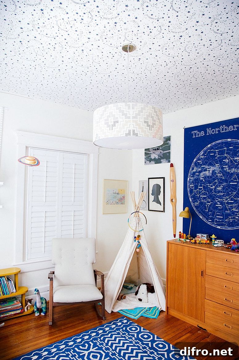 Subtle patterned wallpaper on ceiling adds texture without overwhelming color