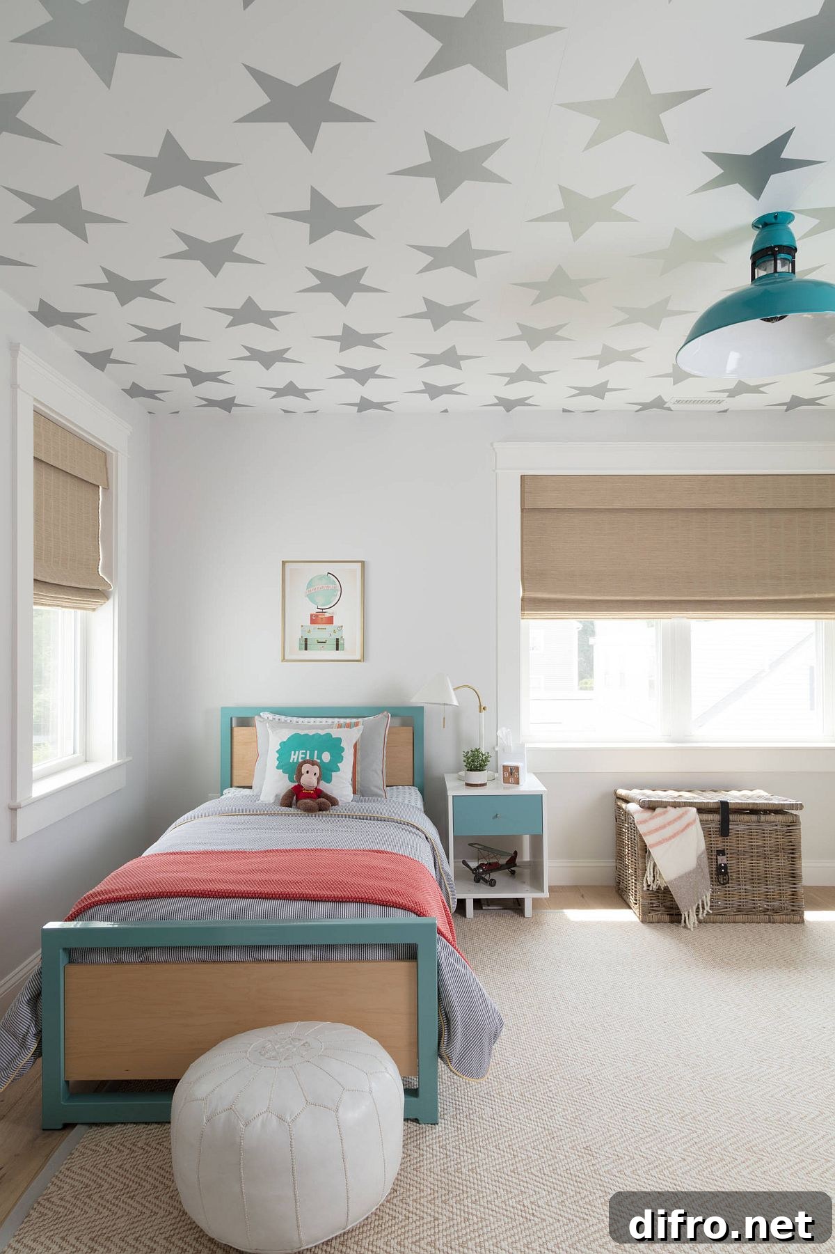 Starry wallpaper pattern on ceiling in a boy's bedroom