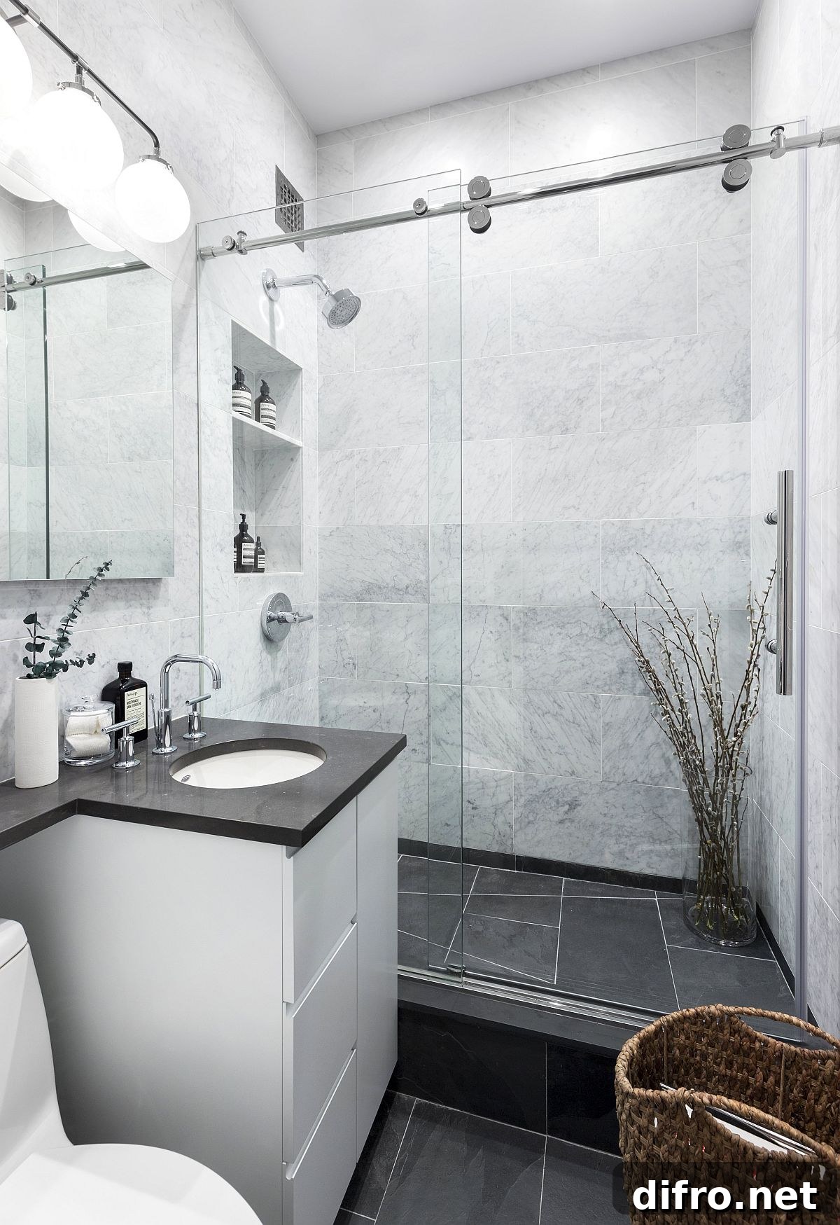 Modern black-and-white bathroom with stone shower