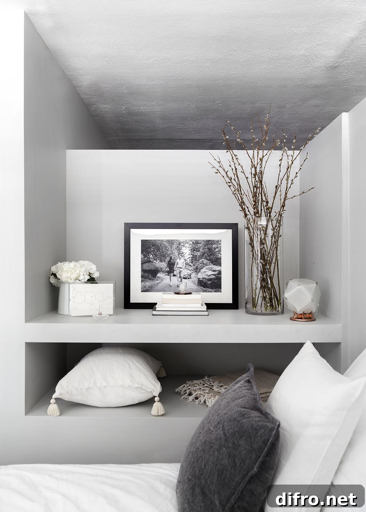 Tiny bedside shelves eliminate need for nightstand