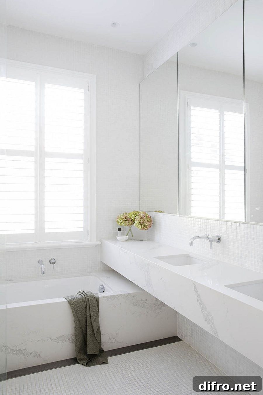 Monochromatic bathroom in white with stone and tile