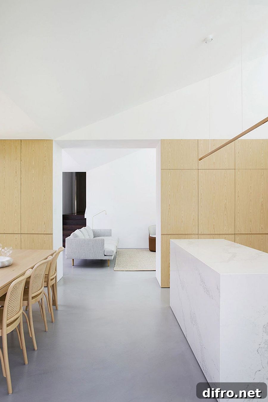 Wood elements bring contrast and warmth to white interior