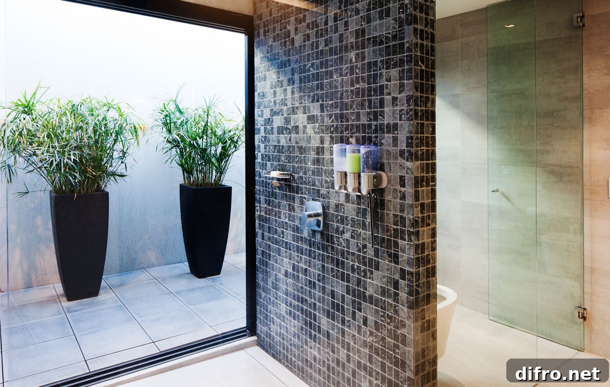 Bathroom on the upper level with a stone shower area