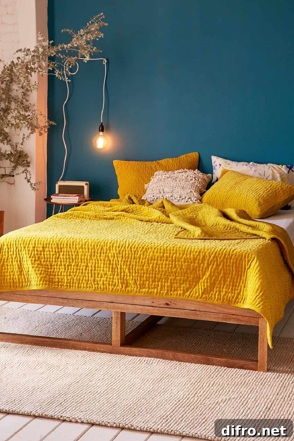 Bedroom with darker yellow accents paired with blue