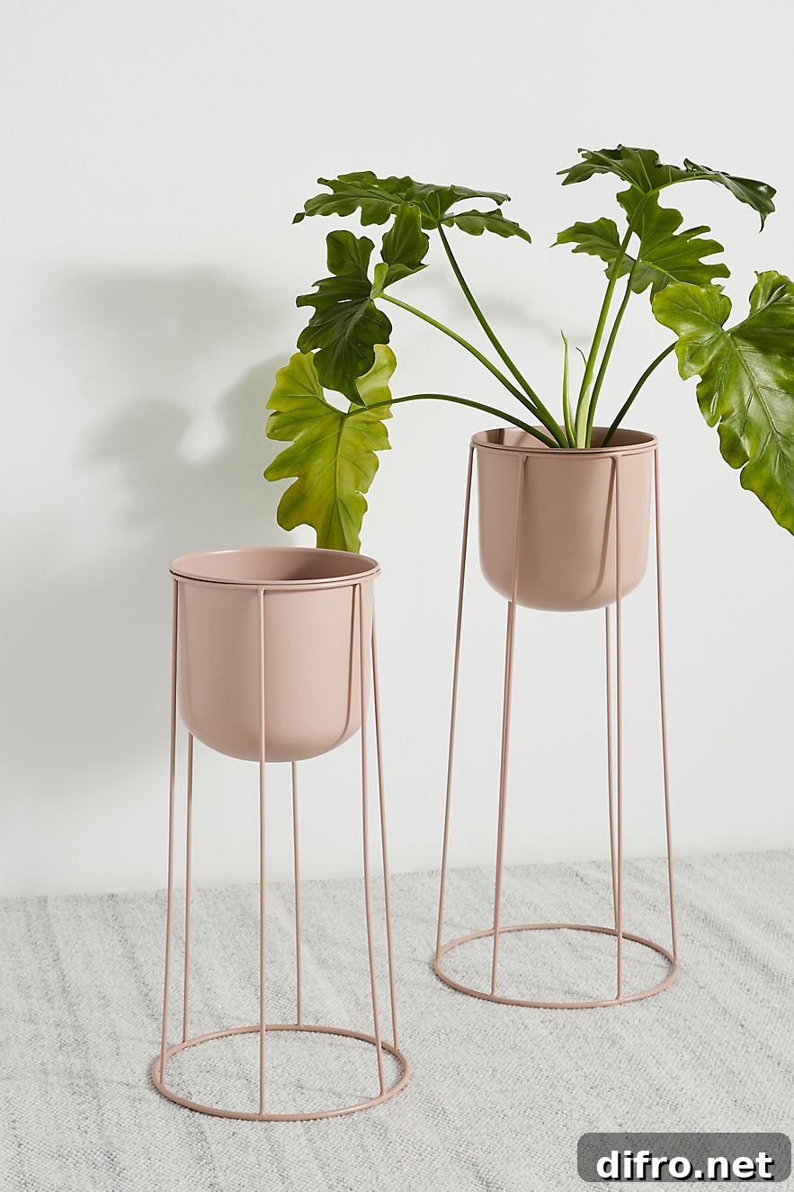 rosy metal pedestal plant stand