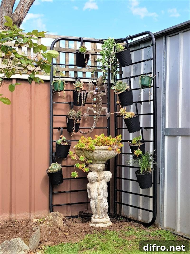 upcycled futon frame into hanging plant stand