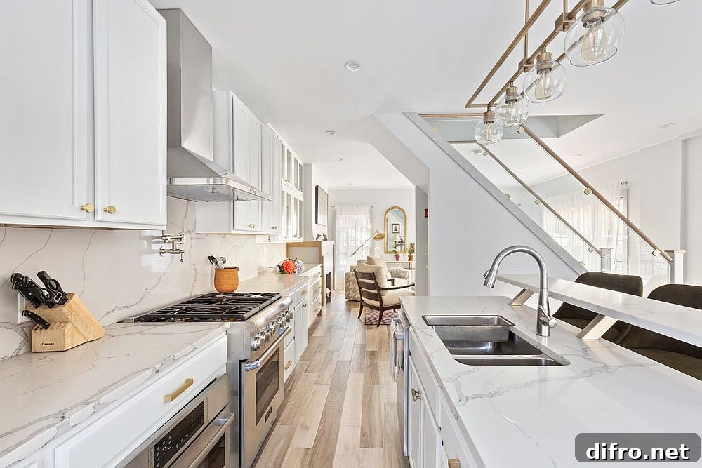 Staircase dividing living and dining area from the kitchen